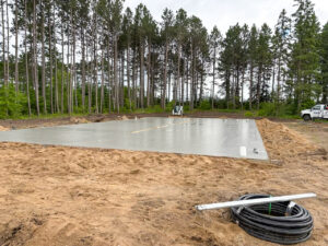 Large residential concrete slab foundation completed by Trepanier Masonry in Bemidji, MN.