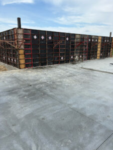Commercial concrete foundation wall forms and concrete slab under construction by Trepanier Masonry in Bemidji, MN.